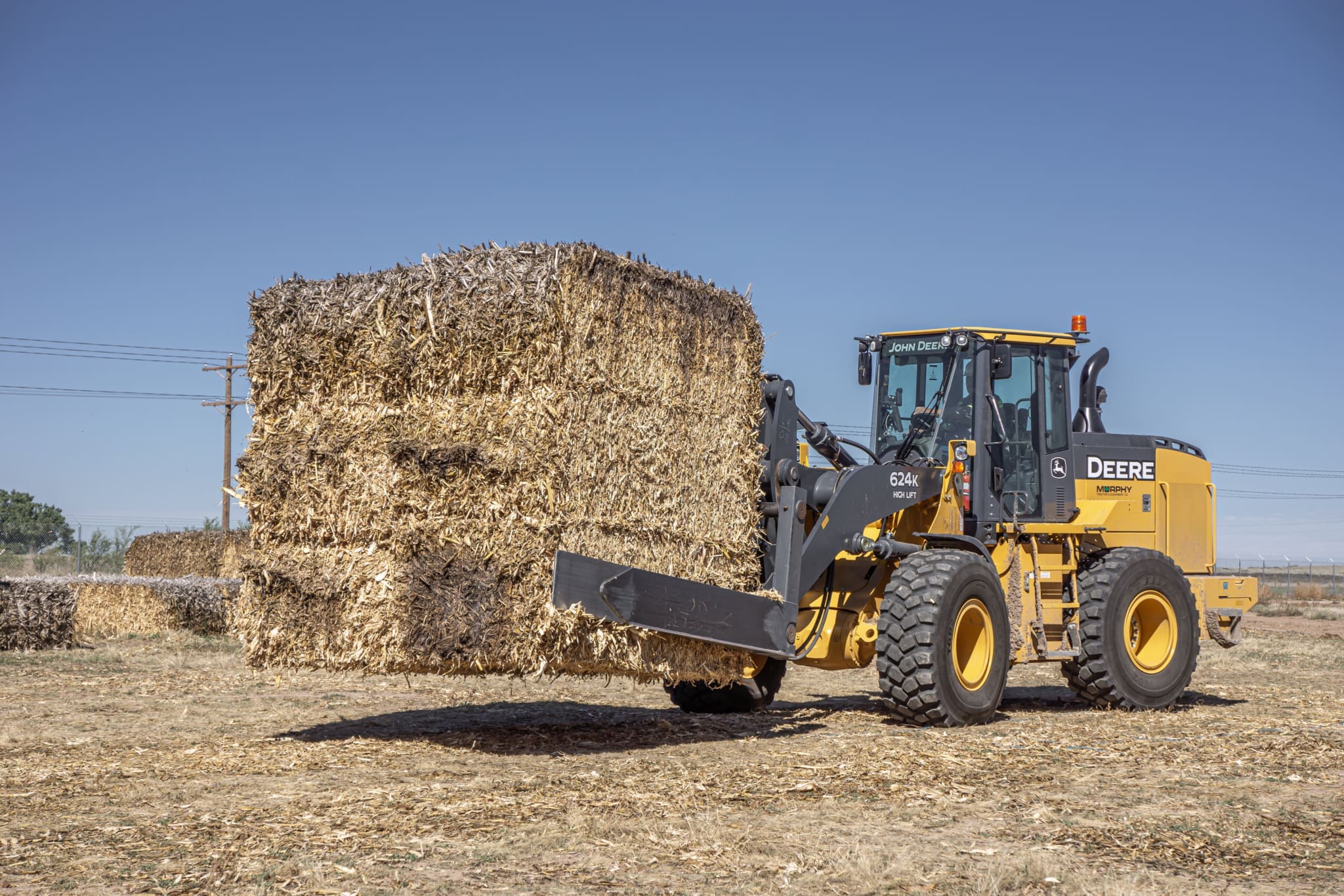 Bale-squeeze-Deere
