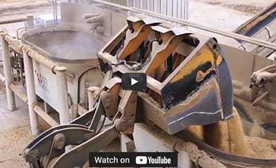 Pushout (Ejector) Bucket Metering Material into Hopper Dymax Pushout ejector bucket metering feed material into hopper using hydraulic push plate instead of roll-out dumping