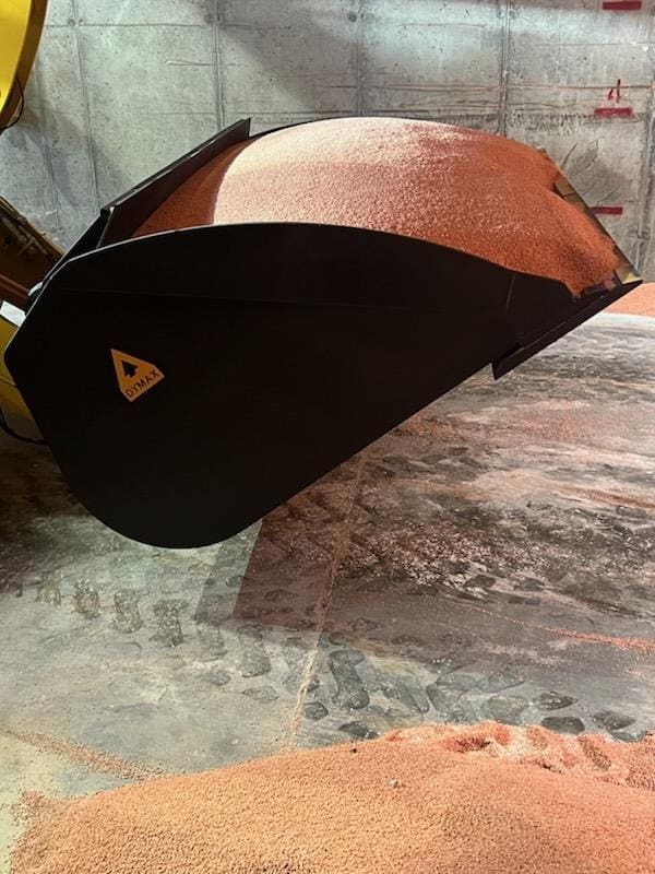 Dymax Fertilizer Bucket – Potash Side View Dymax Fertilizer Bucket at a potash operation, side view showing the long floor and lip