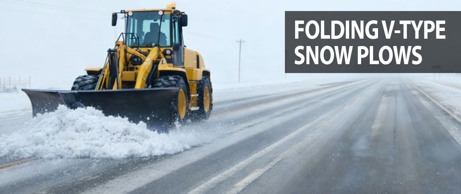 Wheel loader using a Dymax folding V-plow snow plow to clear a snow-covered roadway.