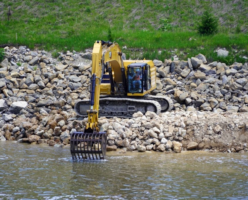 dymax-skeleton-rock-bucket Skeleton rock bucket attachment screening rock and separating fines on the jobsite