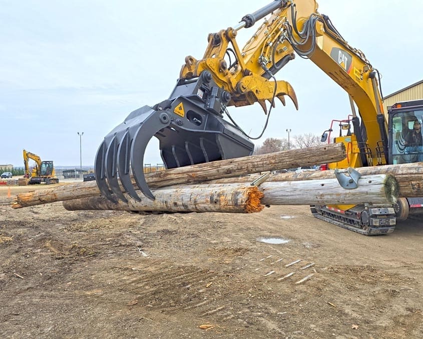 dymax-stone-quarry-block-grapple Stone quarry block grapple handling and placing large stone blocks